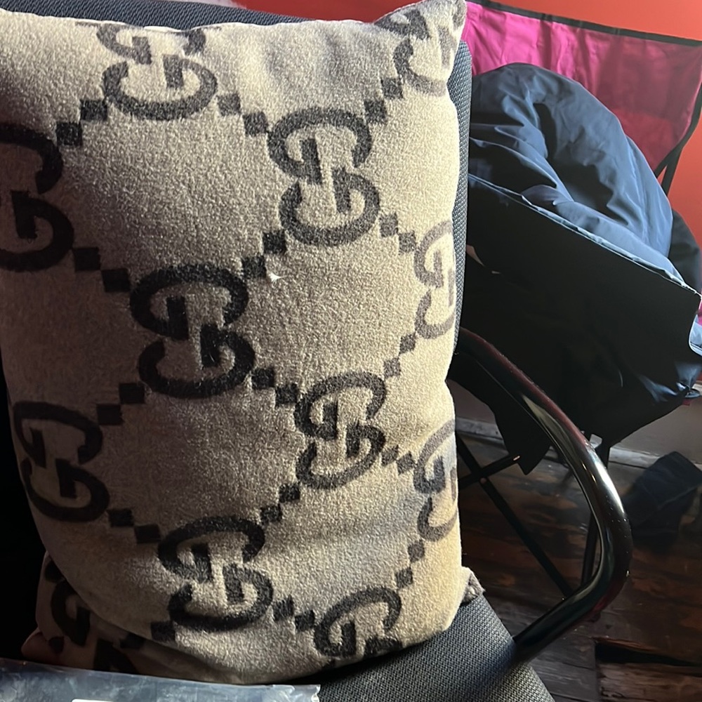 I have two Gucci pillows ready to be sold